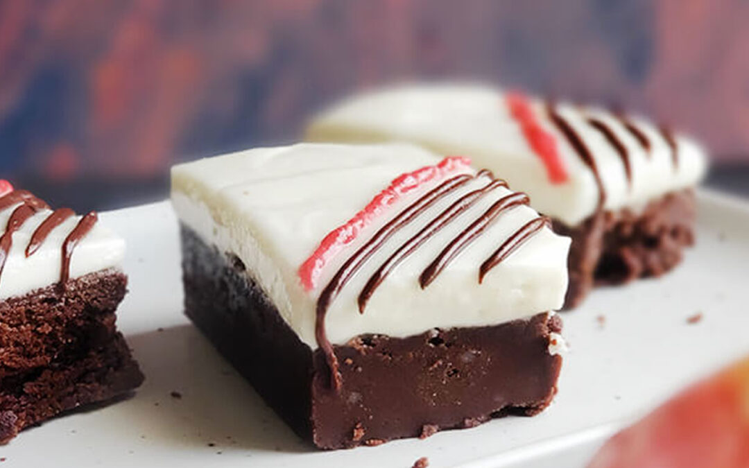 Goat Cheese Brownies with a Dark Chocolate and Raspberry Drizzle